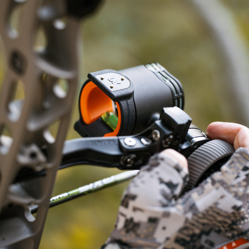 UV Slider™ with an orange viz ring being adjusted by an archer