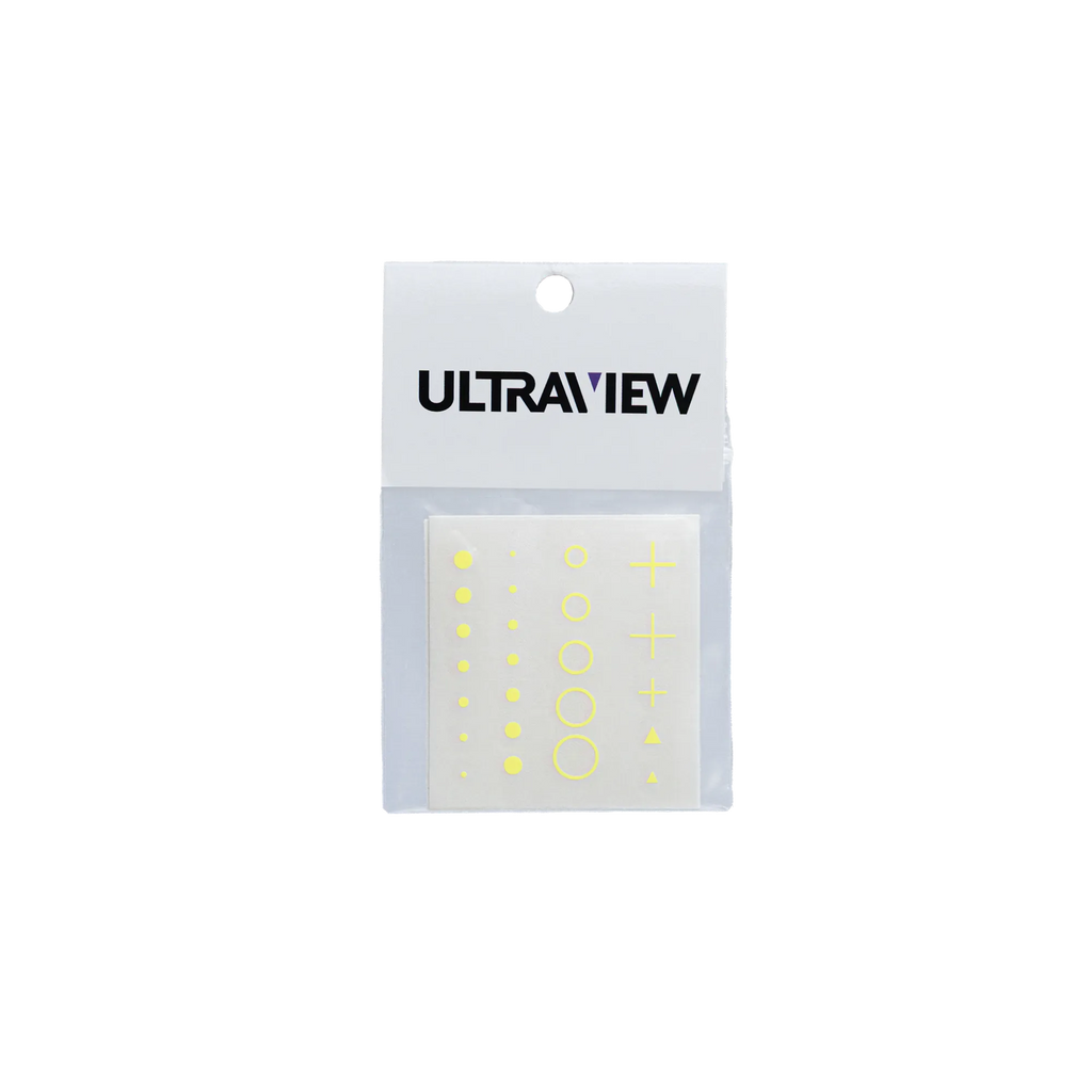 Ultraview UV Dot Kit with four fluorescent target sticker sheets in green, yellow, orange, and red for archery scopes