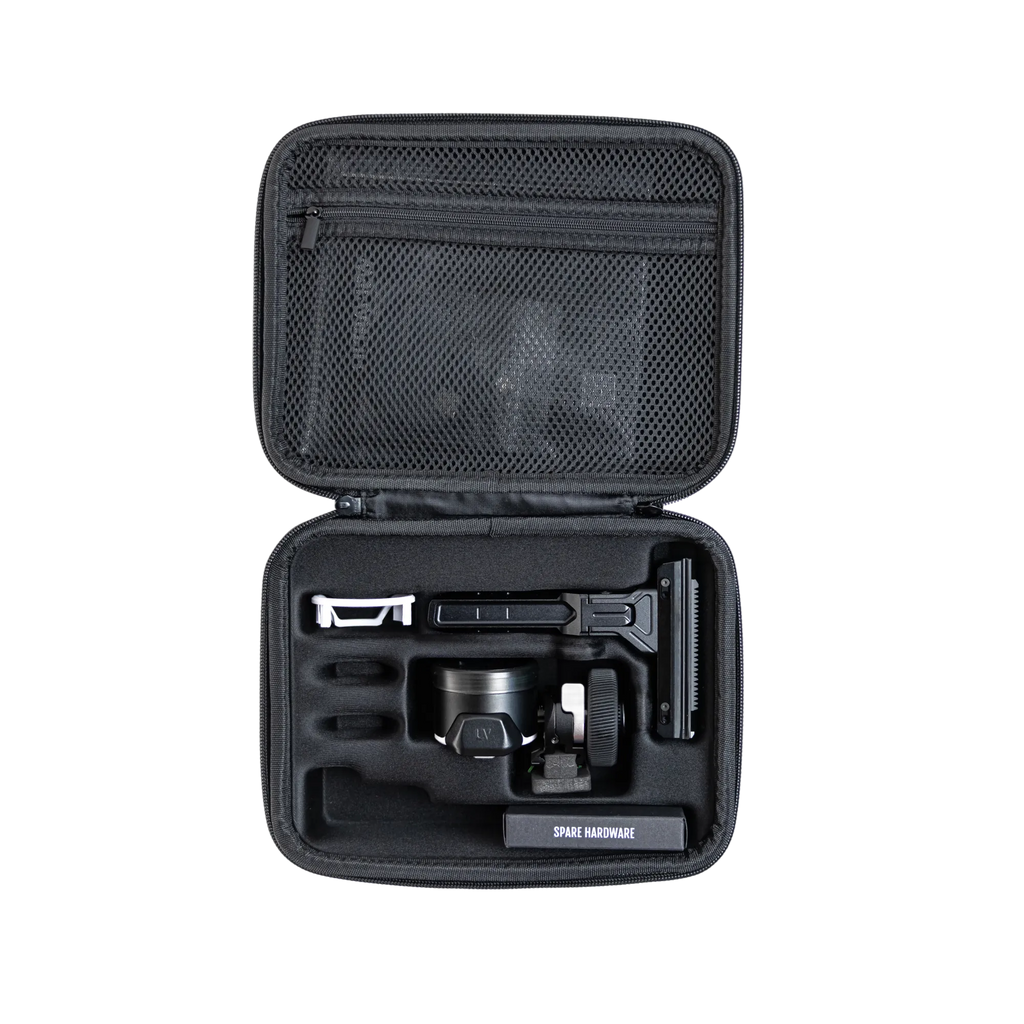 Open UV Slider 2 Travel Case showing padded foam interior with UV Slider™ 2 sight, mounting arm, and spare hardware kit